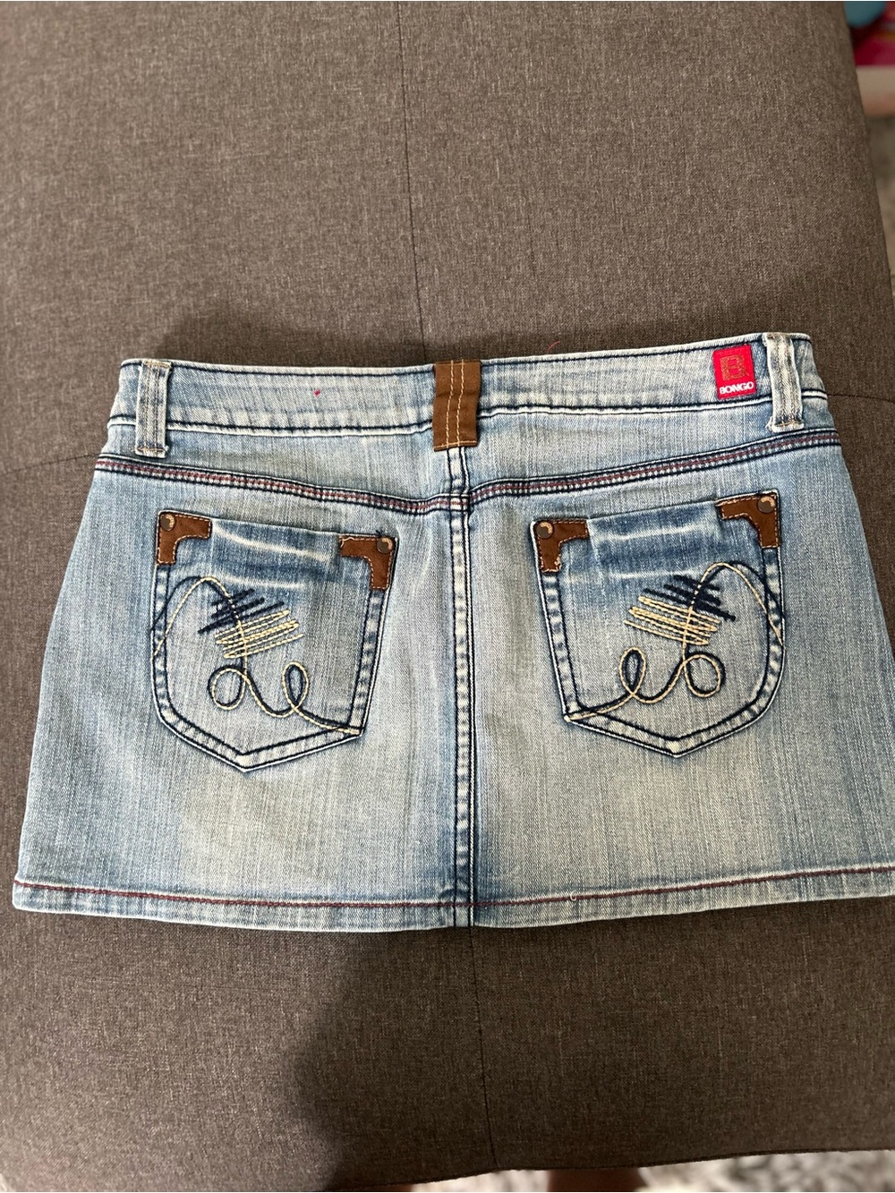 BONGO Light Wash Denim Mini Skirt with Embroidered Back Pockets - Blue